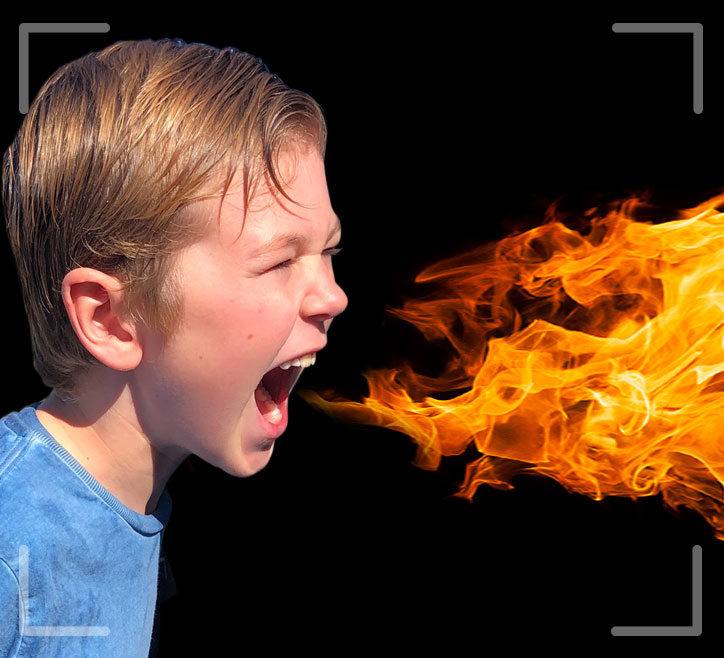 an vfx image of kid breathing fire