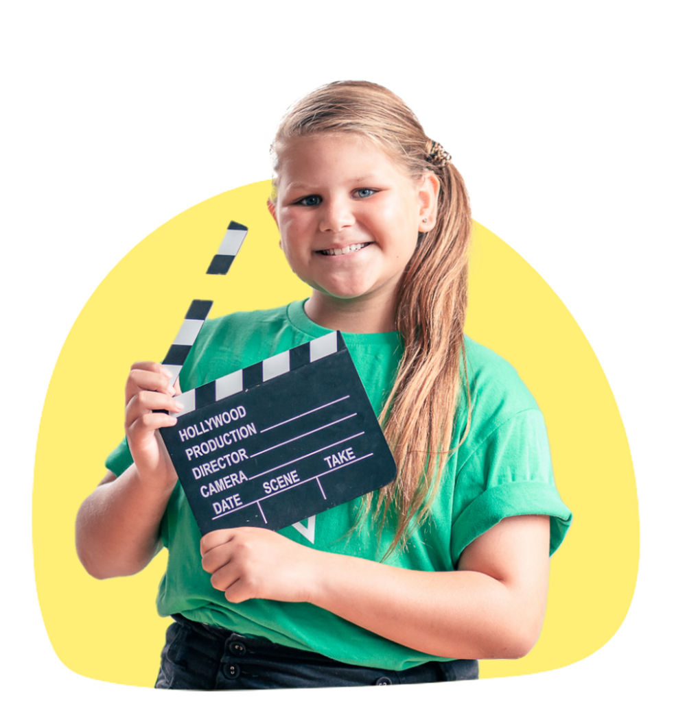 an image of a young girl holding a clapboard